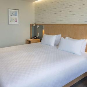 Kamer met een Queen Size Bed